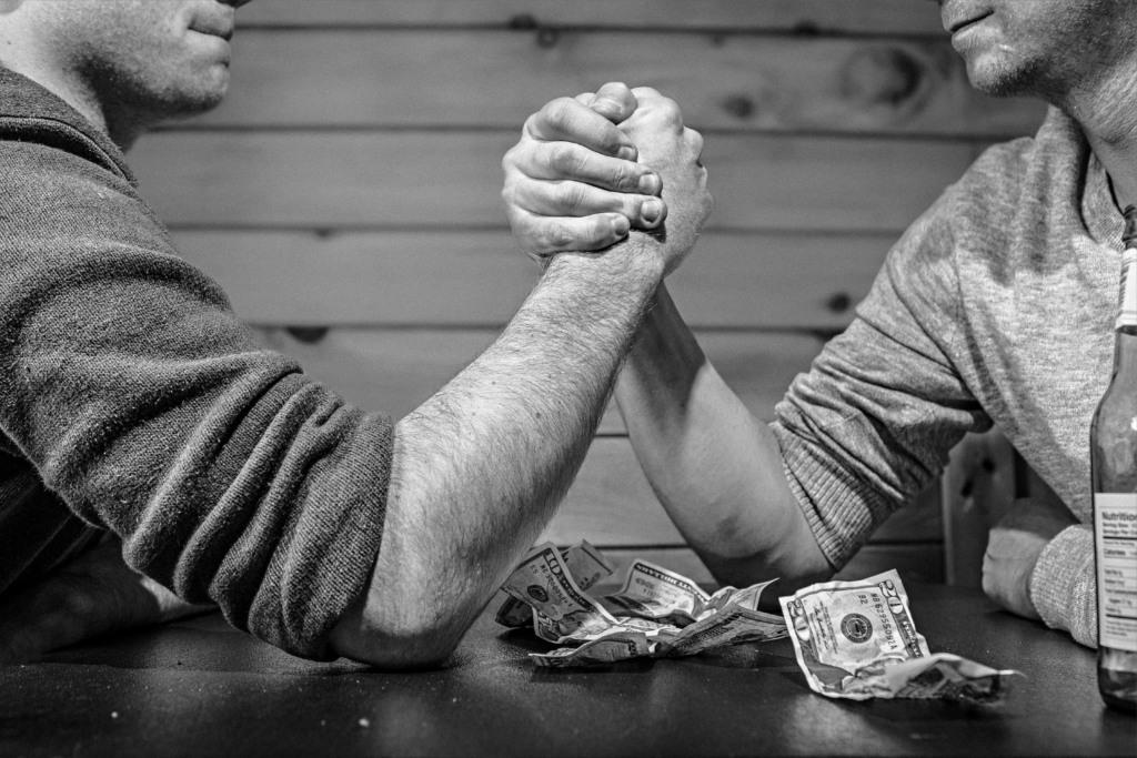 Two men arm wrestling